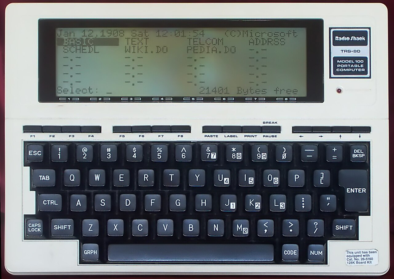 1280px-Radio_Shack_TRS-80_Model_100.png
