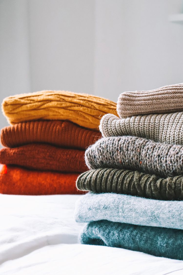colorful-folded-knit-sweaters-in-pile-1-3fed7dfe2d644fd2928f87d8db69a194.jpg